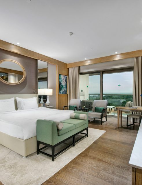 Regnum Carya Jade Room Спальня с частичным видом на море